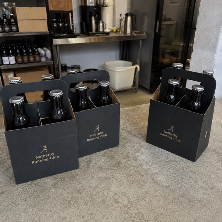 Customized six pack carriers for coffee roasters and cold brew brands